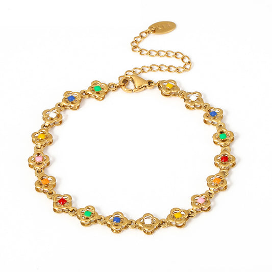 Colored diamond four-leaf clover gold bracelet