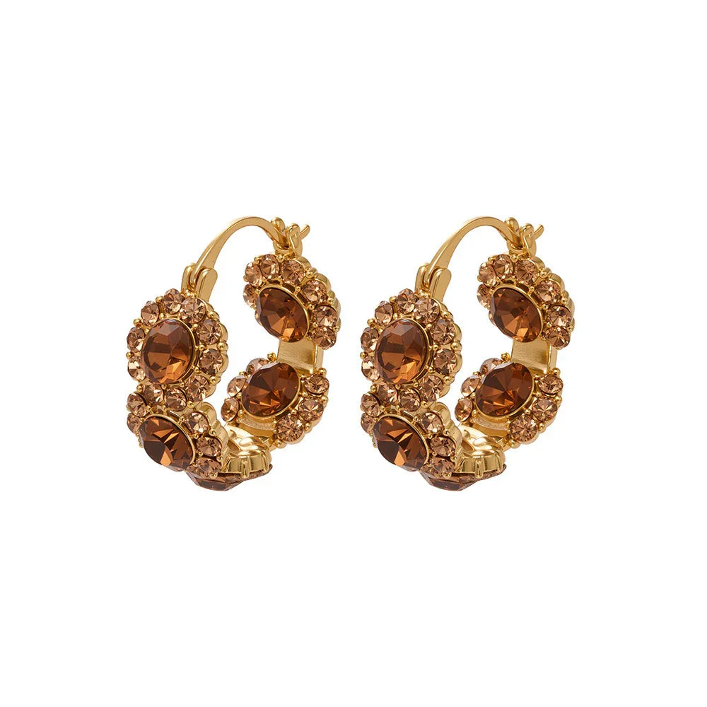 Gold hoop earrings adorned with oval brown gemstones and smaller round crystals, TycheLuck spiritual jewelry